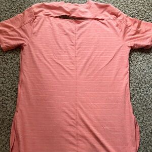 Marmot size small short sleeve women’s shirt with open back detail.